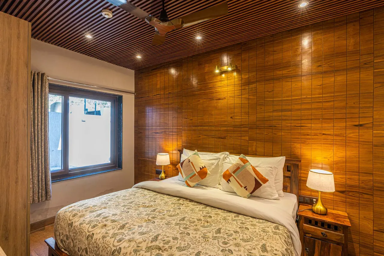 Villa AnVira — wood-panelled bedroom