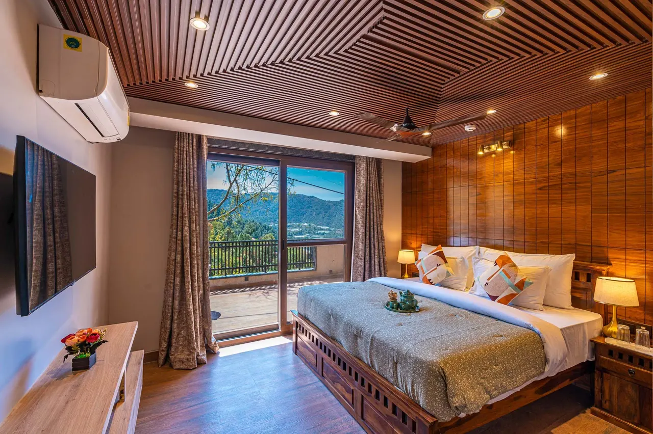 Villa AnVira — bedroom with valley-facing balcony